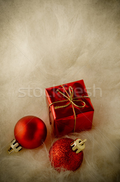 Red Christmas Ornaments on Faux Fur - Vintage Stock photo © frannyanne