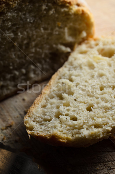 Stock photo: Bread Slice Cut from Freshly Baked Loaf