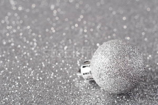 Silver Bauble on Glitter Stock photo © frannyanne