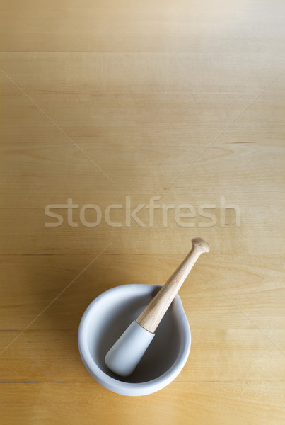 Pestle and Mortar on Wood Stock photo © frannyanne