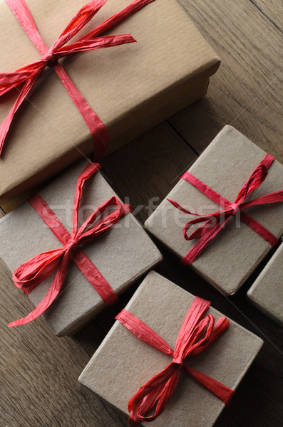 Overhead of Gift Boxes Tied with Red Ribbon on Wood Stock photo © frannyanne