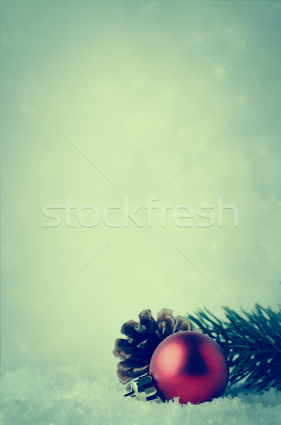 Christmas Background with Red Bauble and Foliage on Snow Stock photo © frannyanne