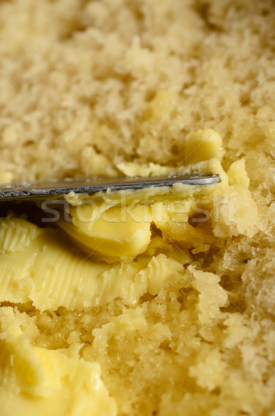 Knife Spreading Butter on Fresh Bread Stock photo © frannyanne