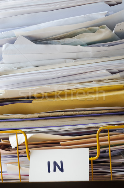 Close Up of In Tray Piled High with Documents and Folders Stock photo © frannyanne