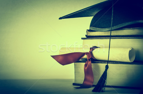 érettségi tekercs könyv boglya kereszt vörös szalag Stock fotó © frannyanne