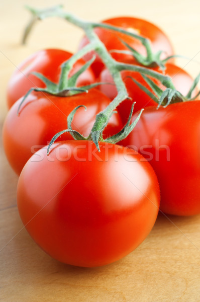 Red Vine Tomatoes on Table Stock photo © frannyanne