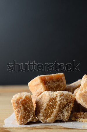 Stock photo: Fudge Pieces on Wood with Black Background
