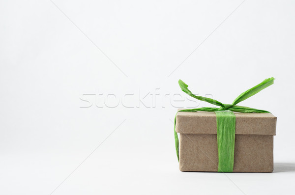 Simple Brown  Gift Box Tied with Green Raffia Ribbon Stock photo © frannyanne
