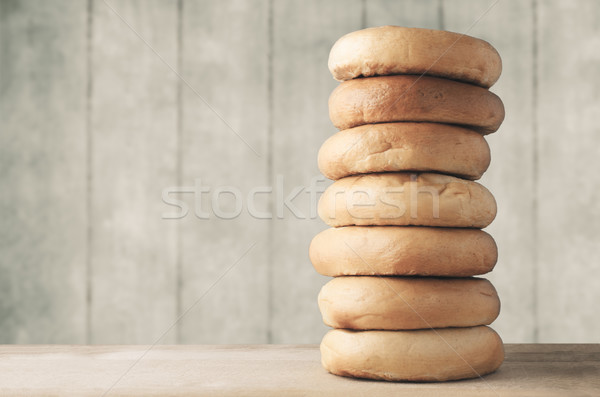 High Bagel Stack on Wood with Planked Background Stock photo © frannyanne