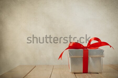 Silver Gift box on Wood Table Stock photo © frannyanne