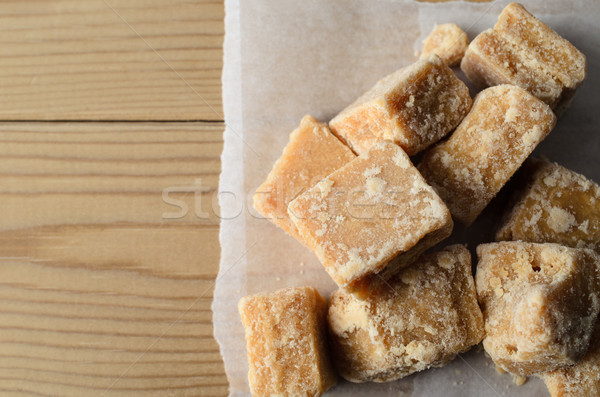 Overhead of Fudge pieces on Parchment Paper and Wood Stock photo © frannyanne
