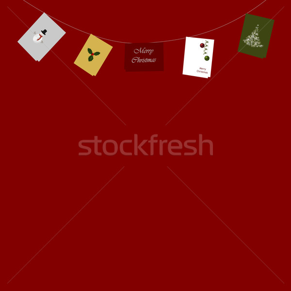 String of Christmas Cards on Red Stock photo © frannyanne