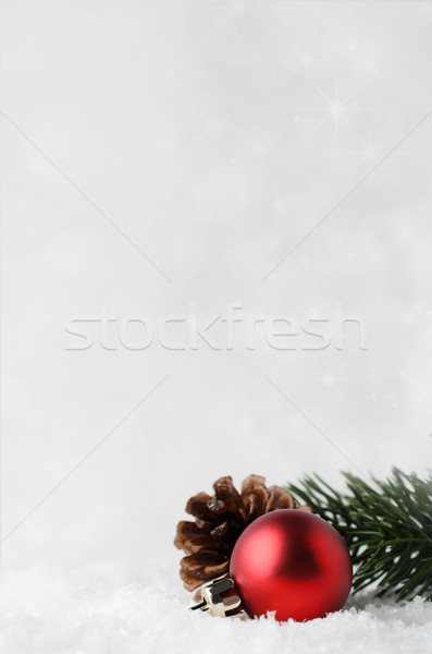 Christmas Background with Red Bauble and Foliage on Snow Stock photo © frannyanne