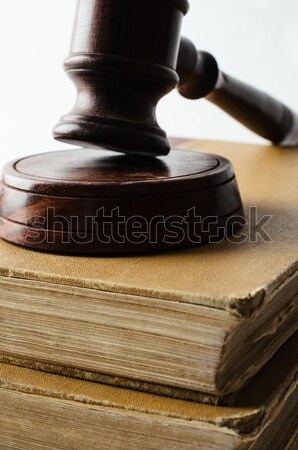 Close up of Wooden Gavel on Old Stack of Books Stock photo © frannyanne