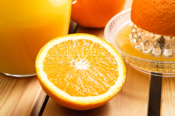 Orange Juice and Squeezer Stock photo © frannyanne