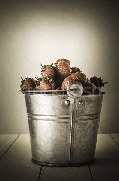 Vintage Pail of Strawberries Stock photo © frannyanne