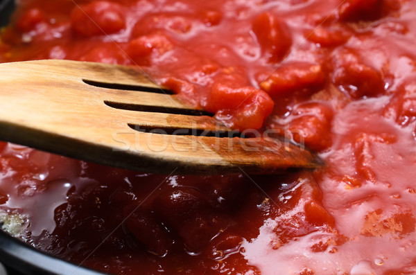 Pan of Tomato Sauce Cooking on Stove Stock photo © frannyanne