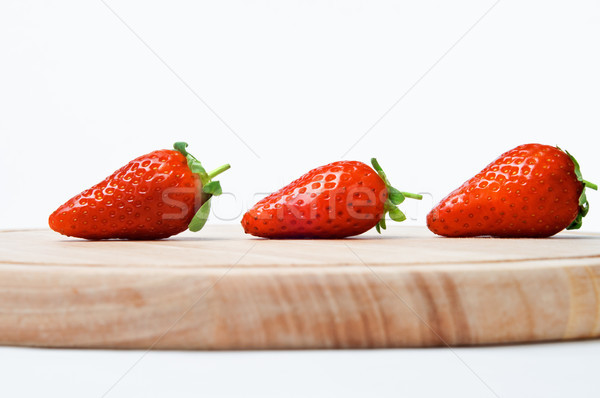 Strawberries On Wooden Board Stock photo © frannyanne