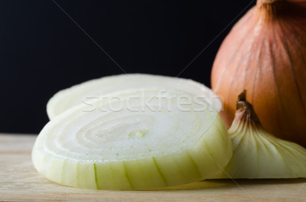 Sliced Onions Close Up with Black Background Stock photo © frannyanne