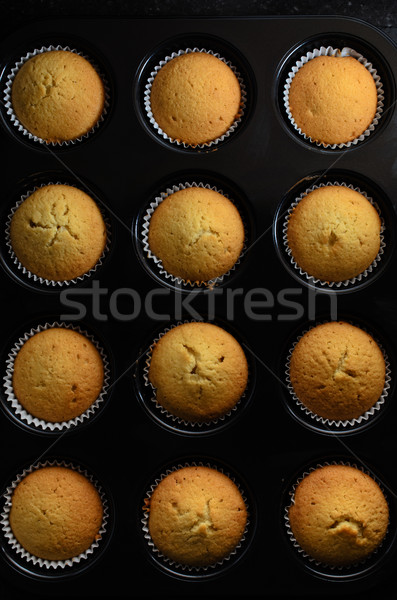 Overhead of Cup Cakes Baked in Bun Tin Stock photo © frannyanne
