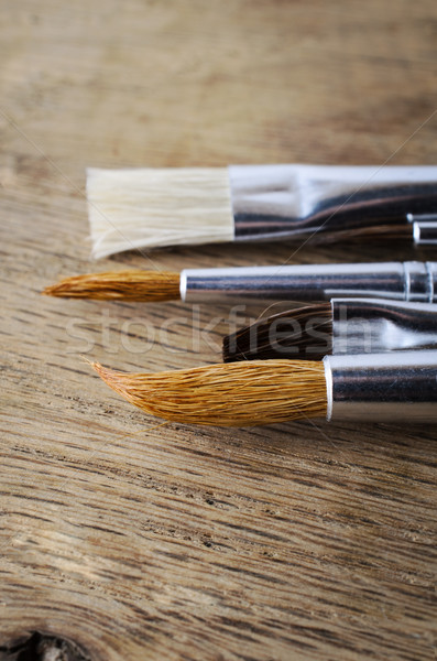 Clean Paintbrushes on Oak Wood Table Stock photo © frannyanne