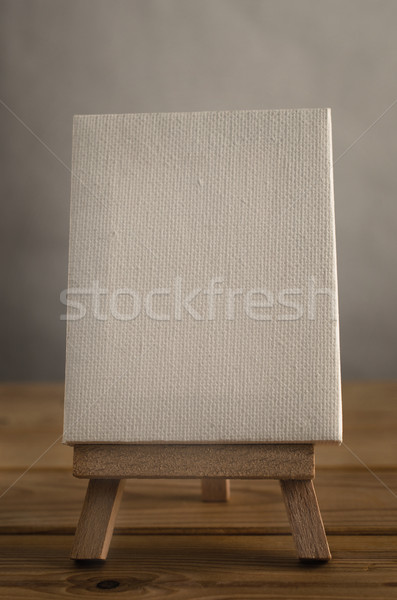 Art Canvas Easel in Portrait Orientation on Wood Plank Floor Stock photo © frannyanne