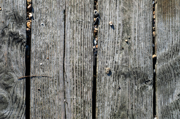 Weathered Beach Boardwalk Planks with Pebble Stones Stock photo © frannyanne