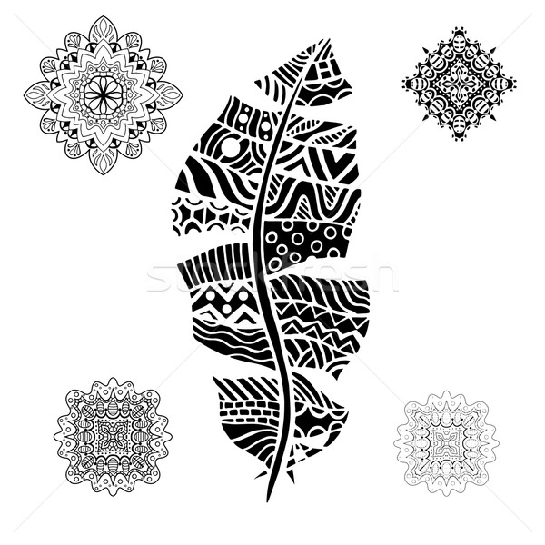 Feather and mandalas Stock photo © frescomovie