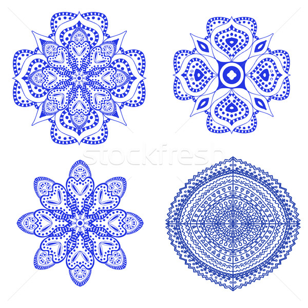 Set of blue floral ornaments Stock photo © frescomovie