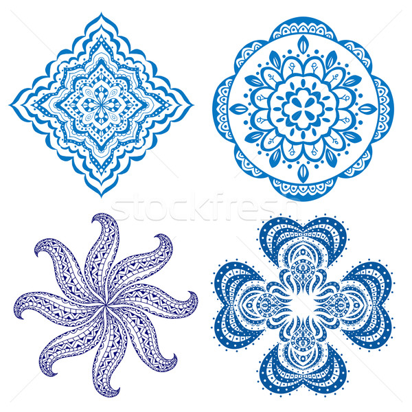 Set blau floral Ornamente isoliert weiß Stock foto © frescomovie