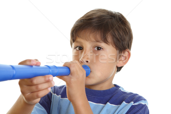 Boy blowing blue horn Stock photo © Freshdmedia