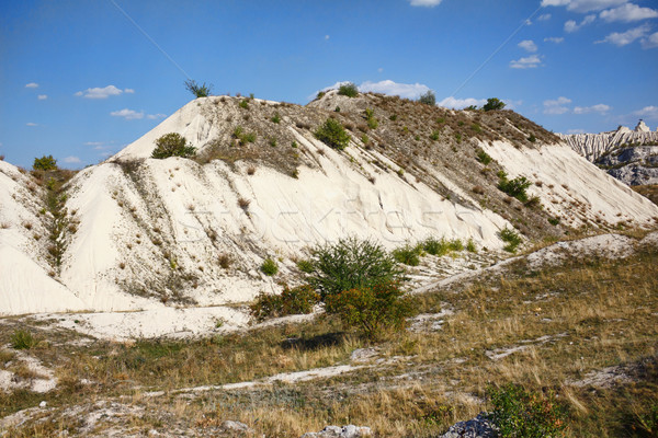 Stock photo: View on hills and fields from a limestone cliff