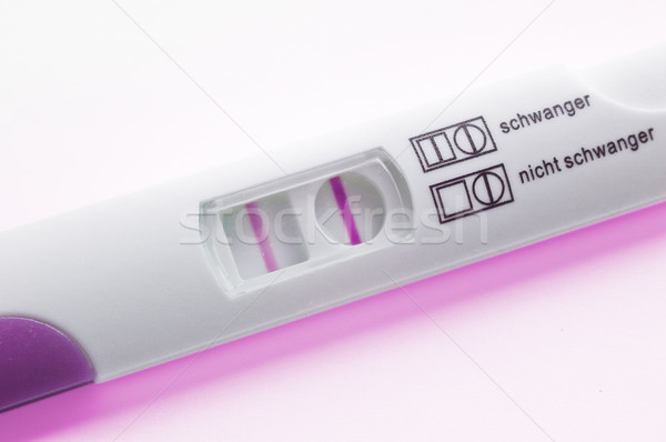 Teste de gravidez positivo mulher médico grávida Foto stock © froxx