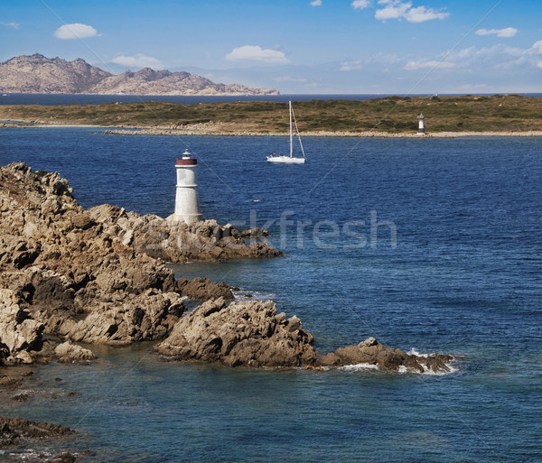 Stock photo: Yacht and lighthouse