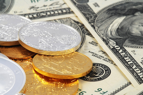 Dollár érmék dollár bankjegyek halom arany Stock fotó © fyletto