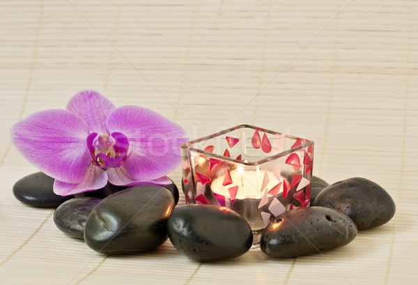 Pink orchid and zen Stones with a candle Stock photo © g215