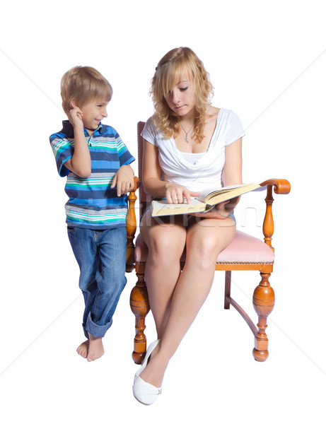 Jeune femme garçon lecture livre blanche [[stock_photo]] © g215