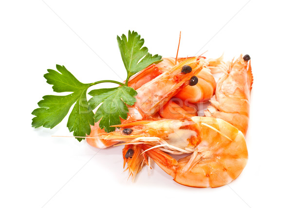 Prawns with a sprig of parsley on a white background Stock photo © g215