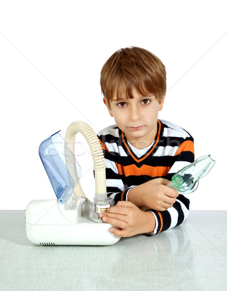 little boy makes inhalation with nebuliser  Stock photo © g215
