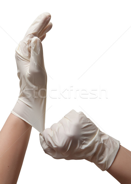 Hands of a doctor in a sterile gloves Stock photo © g215