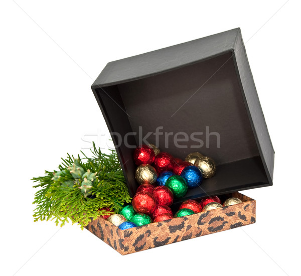 Gift box with balls of chocolate and a sprig of arborvitae. Stock photo © g215