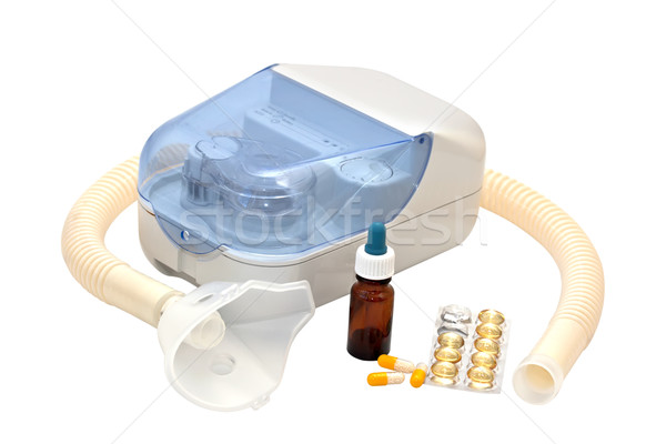 Ultrasonic nebulizer and medicines on a white background Stock photo © g215