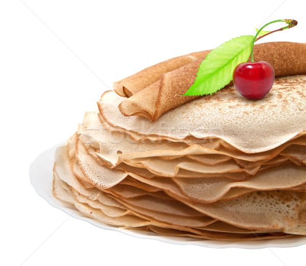 Pancakes with cherries on a white background Stock photo © g215
