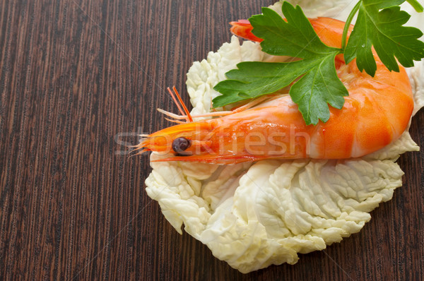 Prawn with a sprig of parsley and salad close up. Stock photo © g215