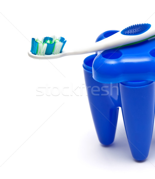 Blue glass for toothbrushes Stock photo © g215