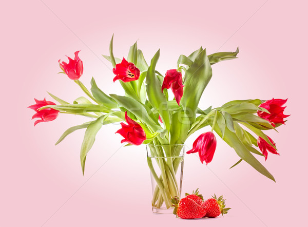 Bouquet of tulips with fresh strawberries. Stock photo © g215