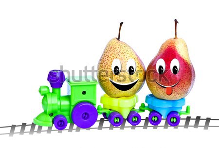 A toy train takes ripe pears. Stock photo © g215