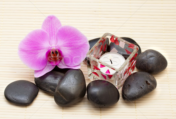 Pink orchid and zen Stones with a candle Stock photo © g215