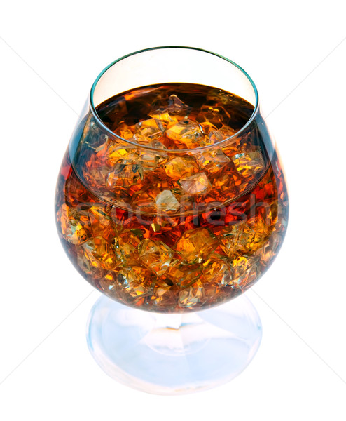 Brandy with ice in a glass. Stock photo © g215