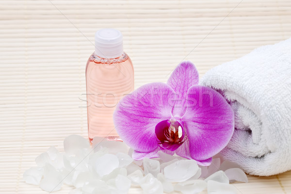 Pink orchid, white towels and bath salts. Spa set Stock photo © g215